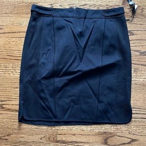 White House Black Market | Size 10. Black bi-stretch pencil skirt. New with tags